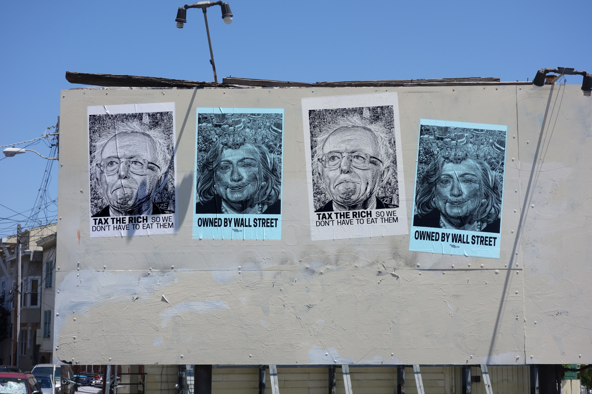 Poster Syndicate Political street art wheat paste of Bernie Sanders and Hillary Clinton  in San Francisco Mission District