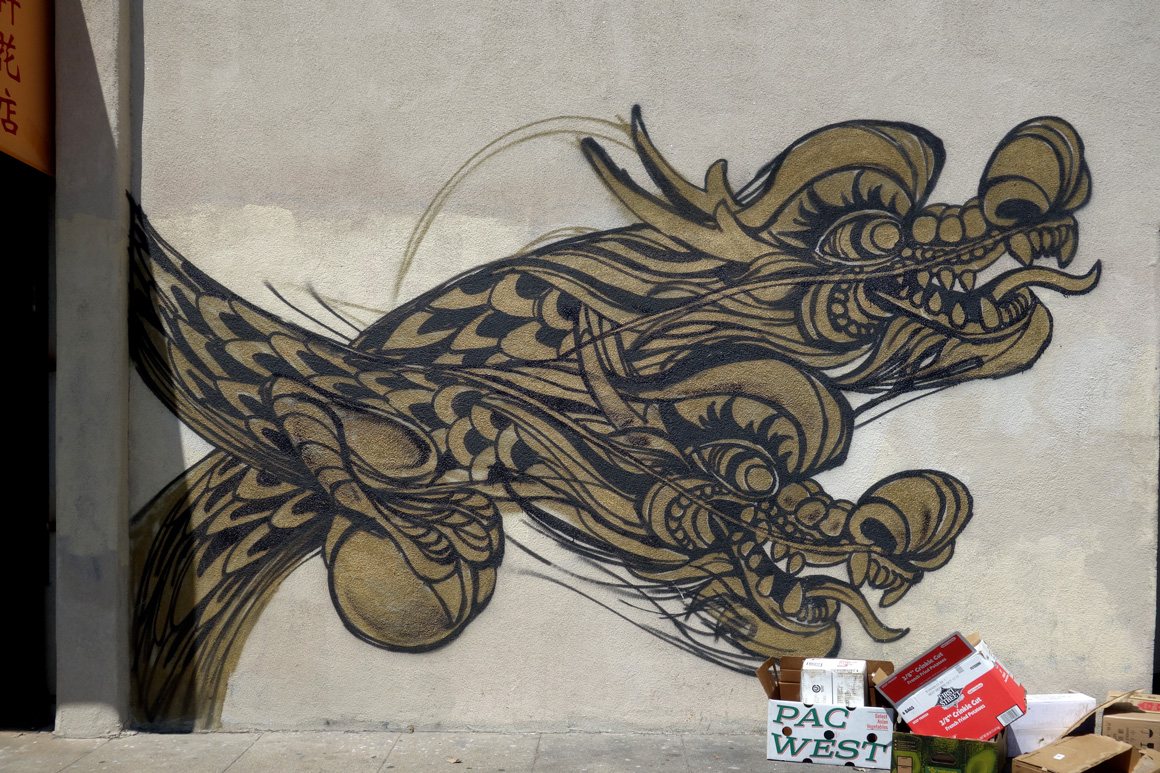 Dragon School street art golden dragons in Oakland Chinatown